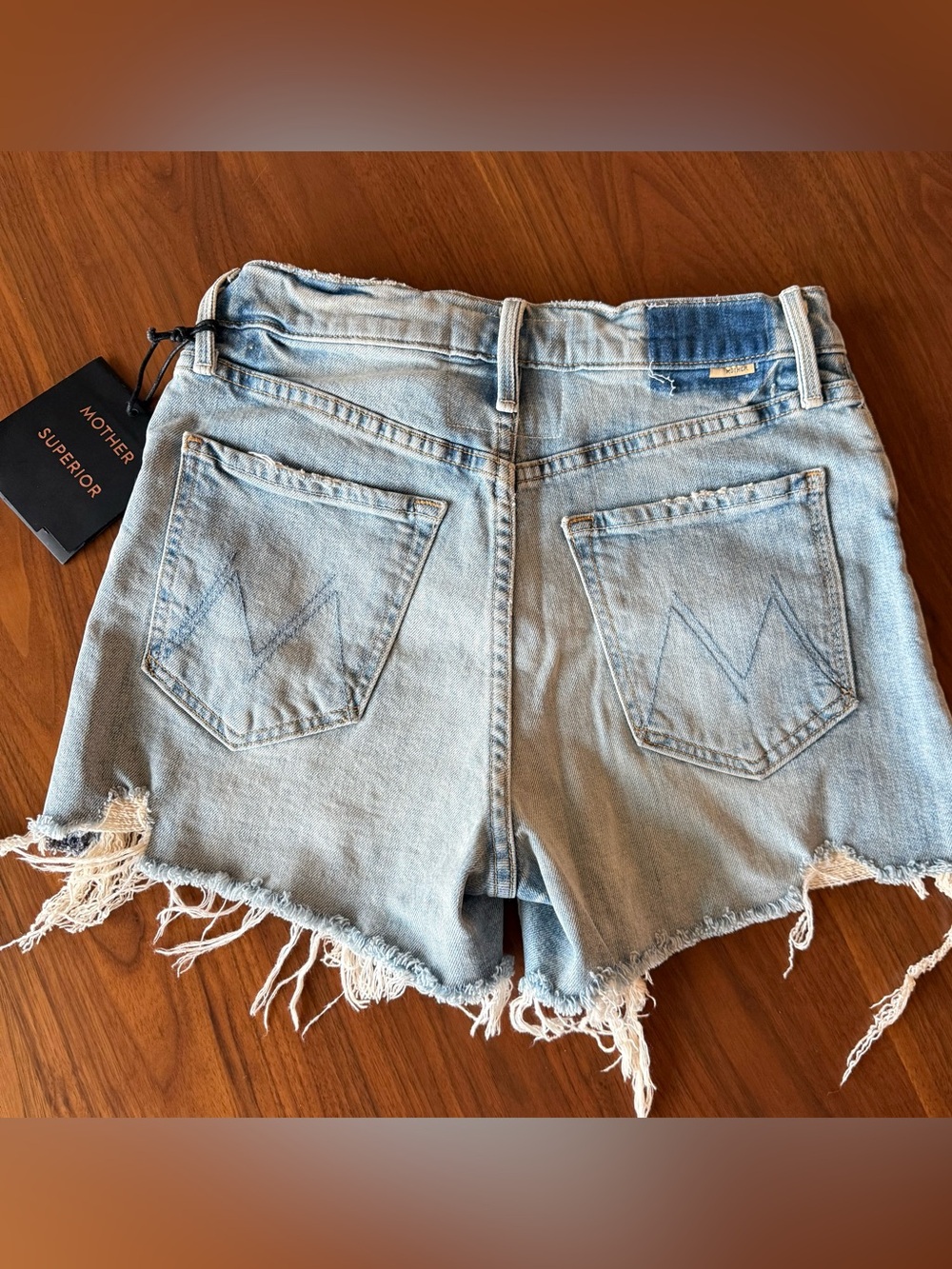 MOTHER Ultra High Waisted Tomcat Fray Denim Shorts - color: I Confess - Picture 7 of 11
